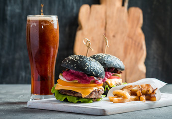 Homemade burger with black bun