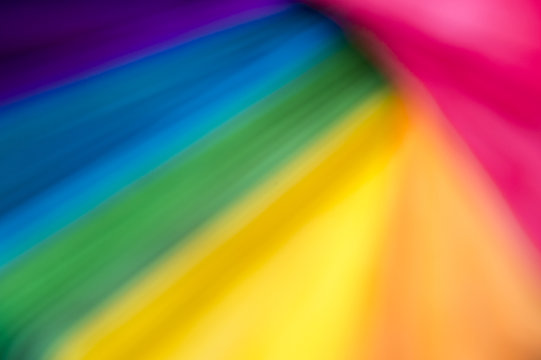 Bright defocussed abstract background of of rainbow spectrum of color