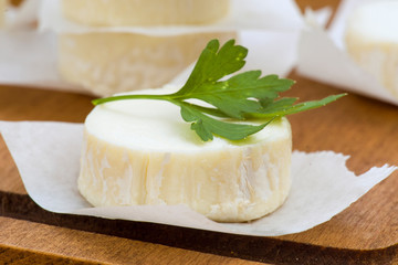 pieces of goat cheese with parsley