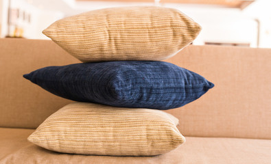 Cozy sofa with pillows. Living room interior and home decor concept