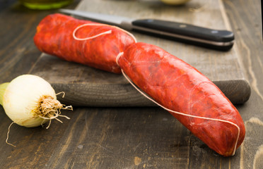 Spanish raw sausages on rustic wooden