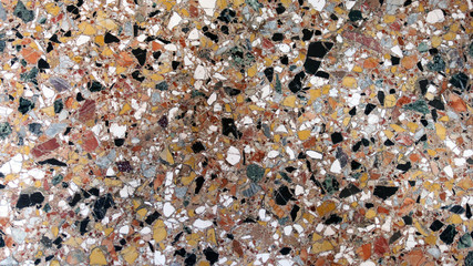 multicolored mosaic polished floor from many pieces of color sto