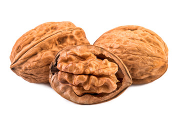 Walnuts whole and half in closeup.