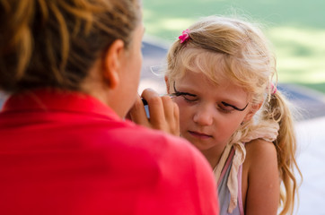 child with face painting