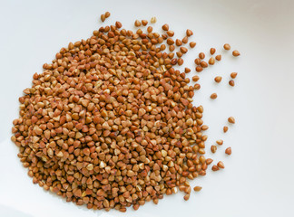 knot red lentils on a white background