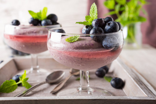 Glass of homemade healthy blueberry dessert