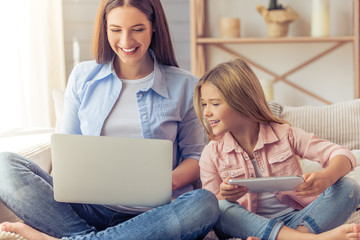 Mom and daughter at home