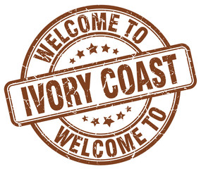 welcome to Ivory Coast brown round vintage stamp