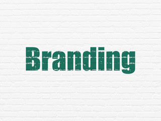 Marketing concept: Branding on wall background