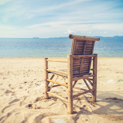 chairs on tropical beach (Vintage filter effect used)