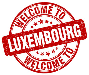 welcome to Luxembourg red round vintage stamp