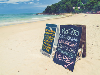 blackboard coffee menu on the beach
