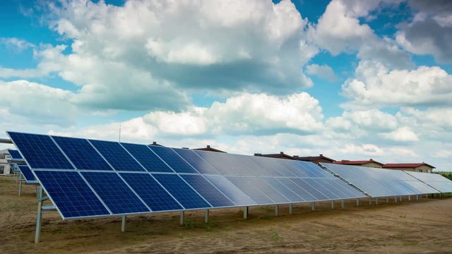 solar panels and modern village, 4K time-lapse