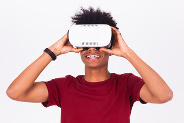 African American young man wearing vr virtual reality headset ov
