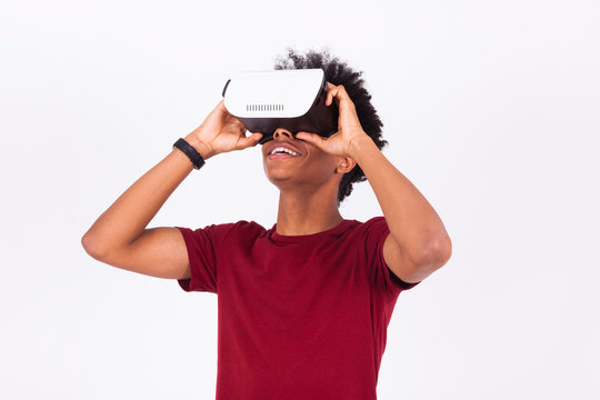 African American young man wearing vr virtual reality headset ov