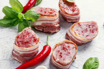 raw pork tenderloin medallions with bacon fillet steak