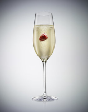 Champagne with raspberry