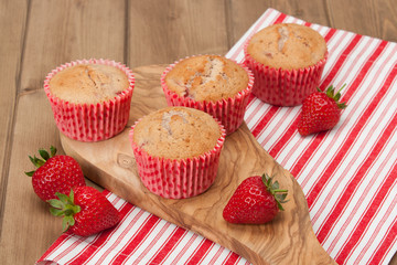 Homebaked Strawberry Cupcakes In Paper Cases. Strawberries. Oliv