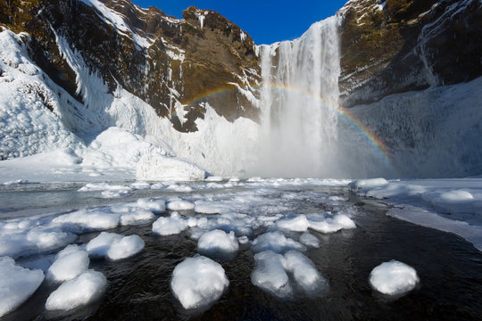 Scenic view of frozen Sk&radic;&ge;gafoss