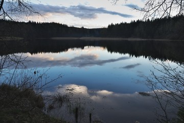 Evening panorama Picture of the old pond or lake from mediaeval age. Picture taken evening before storm in the summer in Czech republic region czech moravian highland. Perfect place for fishing. 