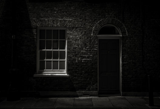 B&W Photo of Victorian House Front at Night