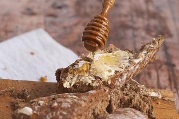  butter and honey on a countryside breakfast - closeup