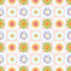 Pastel floral seamless pattern with soft pink color checkerboard tile background. Vector illustration for textiles, home decor, wallpapers design