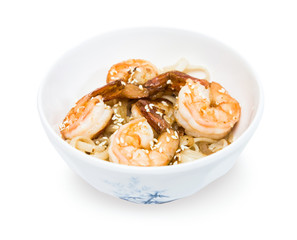 Japanese cuisine : Udon noodles with fried shrimp in a white plate. Isolated on white background