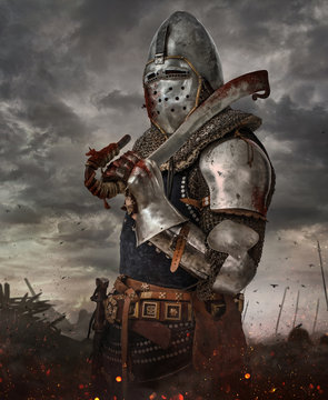 Knight with sword in battlefield.