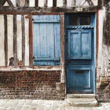 Blue Door On Tudor Style Building