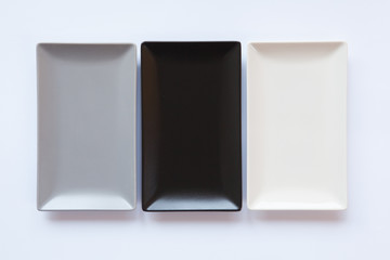 Different  ceramic dishes on over white background,