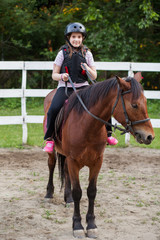 young girl on a horse