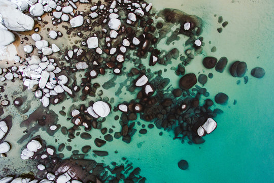 Aerial drone vie of rocks at lake Tahoe