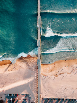 Aerial view of pier on coastline