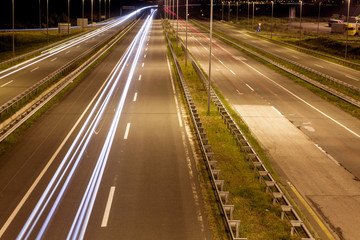 Fototapeta na wymiar Long exposure photo on a highway with light trails