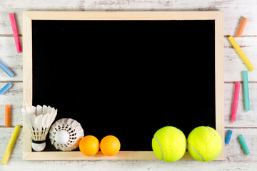 Blank blackboard, Shuttlecock, Ping pong ball and Tennis ball on