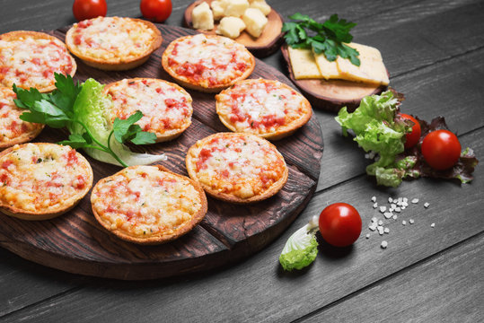 Small pizza with mozzarella cheese