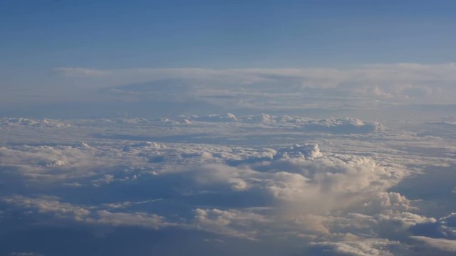 Beautiful clouds through an airplane window (RL Pan, No 5)