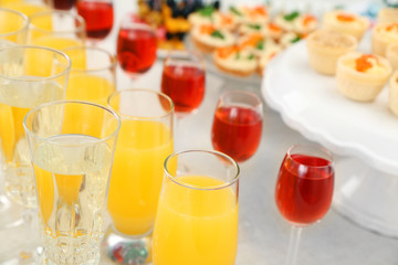 Set of cold snacks, canape, beverages, closeup