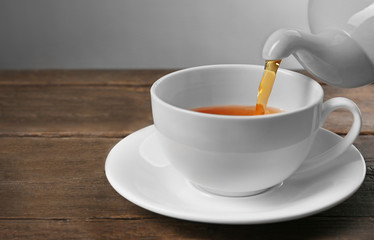 Cup of tea on wooden table