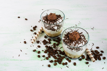 Coffee cocktail with cocoa and chocolate candy