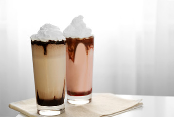 Fresh milk cocktail on table indoors