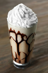 Fresh milk cocktail on wooden background