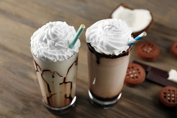 Fresh milk cocktail on wooden background