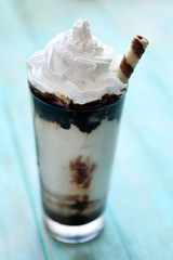 Fresh milk cocktail on wooden background