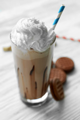 Fresh milk cocktail on wooden background