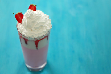 Fresh milk cocktail on wooden background
