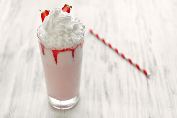 Fresh milk cocktail on wooden background