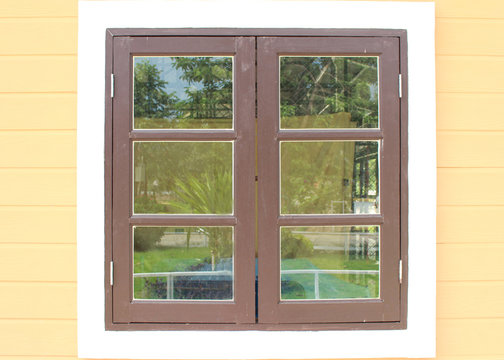 Wooden table over summer window background
