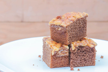 Close up image of walnut toffee cake